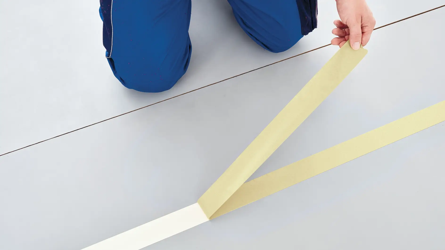 Application of tesa® 5939 White Carpet Tape: Step 2