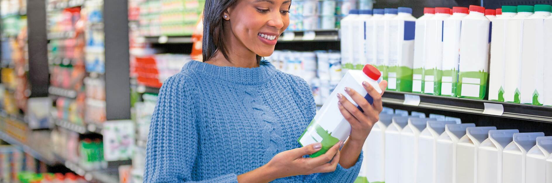 Lady in supermarket shopping