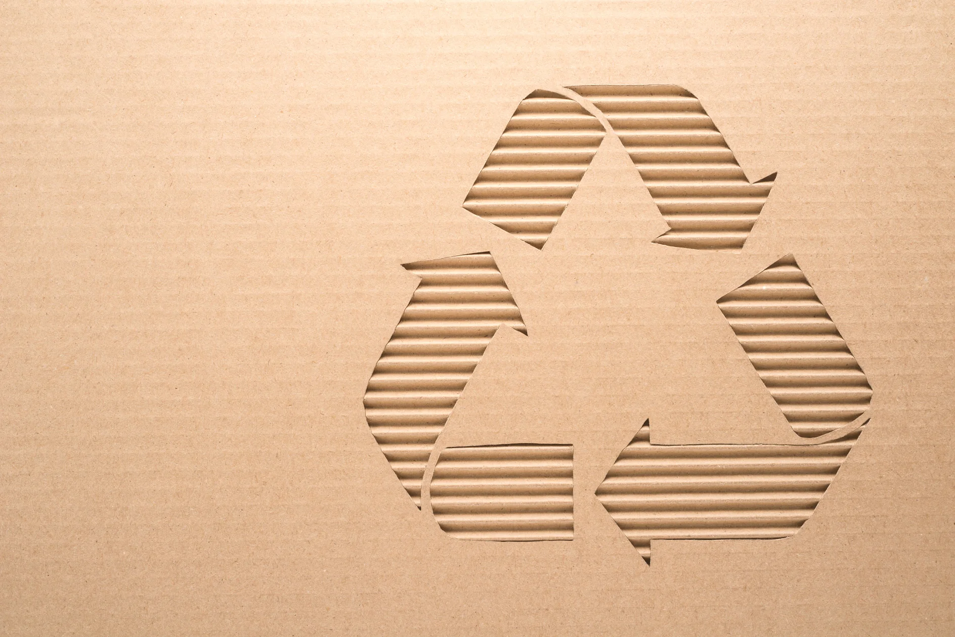  Recycle sign on a corrugated cardboard 