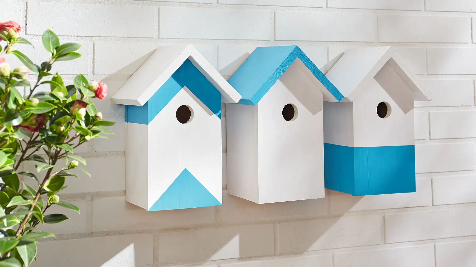 Designer wooden bird houses for your garden